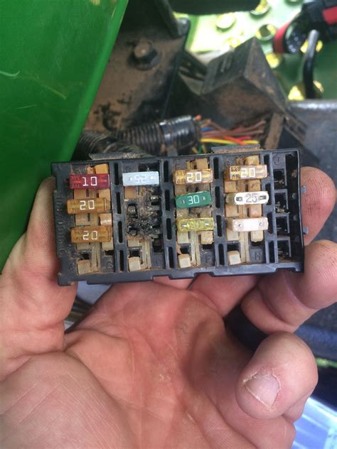 Changing a fuse on a John Deere 1025r Tractor Therapy 2. . John deere tractor fuse box diagram
